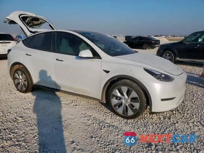 Czwarte zdjęcie samochodu z boku: 2023 TESLA MODEL Y VIN:7SAYGDEE2PA166803 - miniatura