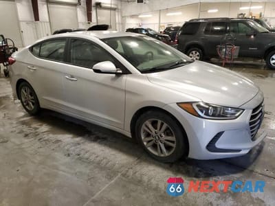 Czwarte zdjęcie samochodu z boku: 2017 HYUNDAI ELANTRA SE VIN:KMHD84LF1HU215517 - miniatura