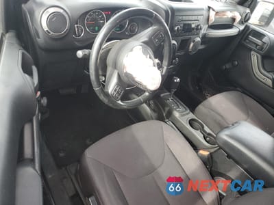 Zdjęcie 8 z 13 samochodu: 2015 JEEP WRANGLER SPORT VIN:1C4AJWAG6FL678646 - miniatura