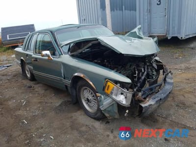 Czwarte zdjęcie samochodu z boku: 1994 LINCOLN TOWN CAR EXECUTIVE VIN:1LNLM81W9RY665394 - miniatura