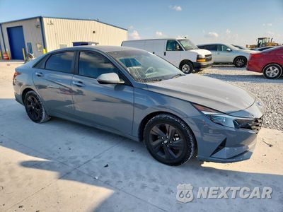 Czwarte zdjęcie samochodu z boku: 2021 HYUNDAI ELANTRA BLUE VIN:KMHLM4AJ1MU008974 - miniatura