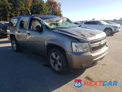 Czwarte zdjęcie samochodu z boku: 2007 CHEVROLET SUBURBAN C1500 VIN:1GNFC16067R409275 - miniatura