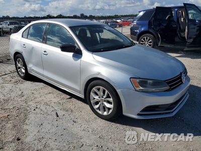 Czwarte zdjęcie samochodu z boku: 2016 VOLKSWAGEN JETTA S VIN:3VW267AJ0GM322447 - miniatura