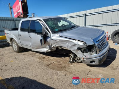 Czwarte zdjęcie samochodu z boku: 2013 FORD F150 SUPERCREW VIN:1FTFW1ET9DFD03234 - miniatura