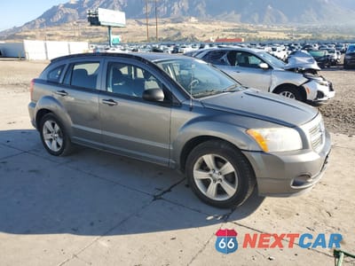 Czwarte zdjęcie samochodu z boku: 2011 DODGE CALIBER MAINSTREET VIN:1B3CB3HA3BD254563 - miniatura