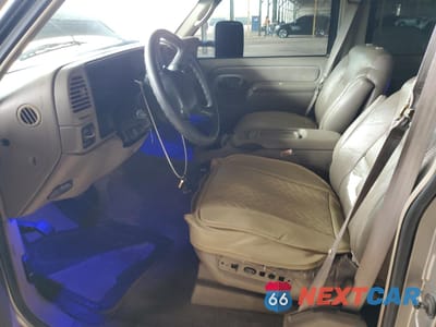 Zdjęcie 7 z 12 samochodu: 1999 CHEVROLET TAHOE K1500 VIN:1GNEK13R9XJ457367 - miniatura