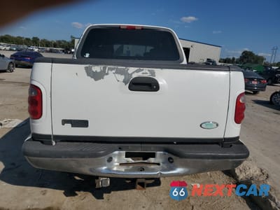 Zdjęcie 6 z 14 samochodu: 2001 FORD F150 SUPERCREW VIN:1FTRW07L31KB53225 - miniatura