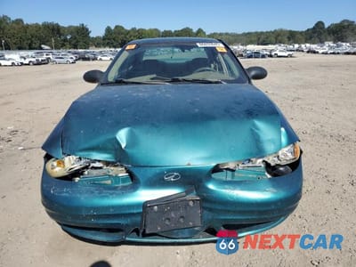 Piąte zdjęcie samochodu w środku: 1999 OLDSMOBILE ALERO GL VIN:1G3NL52T2XC419980 - miniatura