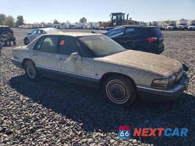 Czwarte zdjęcie samochodu z boku: 1993 BUICK PARK AVENUE ULTRA VIN:1G4CU5317P1613011 - miniatura