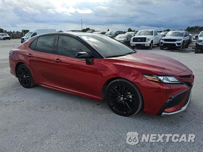 Czwarte zdjęcie samochodu z boku: 2024 TOYOTA CAMRY XSE VIN:4T1K61AK3RU262996 - miniatura