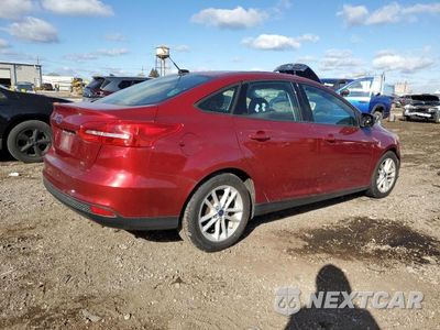 Trzecie zdjęcie samochodu z tyłu: 2017 FORD FOCUS SE VIN:1FADP3F28HL242817 - miniatura
