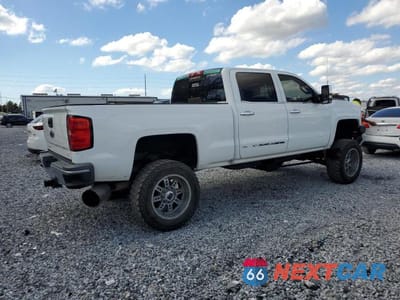 Trzecie zdjęcie samochodu z tyłu: 2015 CHEVROLET SILVERADO K2500 HEAVY DUTY LTZ VIN:1GC1KWE82FF667349 - miniatura