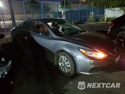 Czwarte zdjęcie samochodu z boku: 2017 NISSAN ALTIMA 2.5 VIN:1N4AL3AP9HN362762 - miniatura