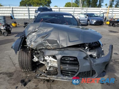 Piąte zdjęcie samochodu w środku: 2026 BMW M4 COMPETITION VIN:WBS23HK00TCV73634 - miniatura