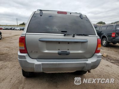 Zdjęcie 6 z 13 samochodu: 2000 JEEP GRAND CHEROKEE LAREDO VIN:1J4GW48S1YC407632 - miniatura