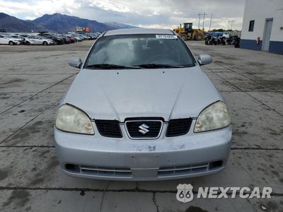 Piąte zdjęcie samochodu w środku: 2004 SUZUKI FORENZA S VIN:KL5JD52Z74K982191 - miniatura