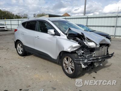 Czwarte zdjęcie samochodu z boku: 2012 HYUNDAI TUCSON GLS VIN:KM8JU3AC1CU517707 - miniatura