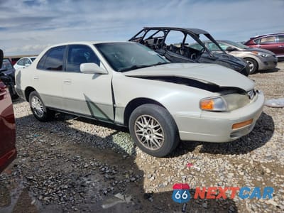 Czwarte zdjęcie samochodu z boku: 1996 TOYOTA CAMRY LE VIN:JT2BF12K9T0134918 - miniatura