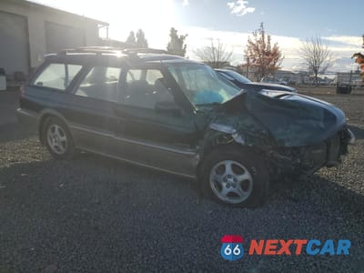 Czwarte zdjęcie samochodu z boku: 1999 SUBARU LEGACY OUTBACK VIN:4S3BG6852X7646231 - miniatura