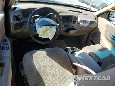 Zdjęcie 8 z 15 samochodu: 2000 FORD F150 VIN:1FTRX17W6YKA41445 - miniatura