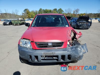 Piąte zdjęcie samochodu w środku: 1999 HONDA CR-V LX VIN:JHLRD1846XC041933 - miniatura