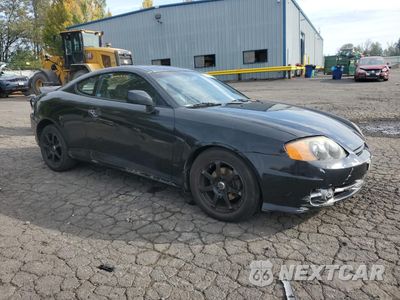 Czwarte zdjęcie samochodu z boku: 2003 HYUNDAI TIBURON VIN:KMHHN65F13U077098 - miniatura