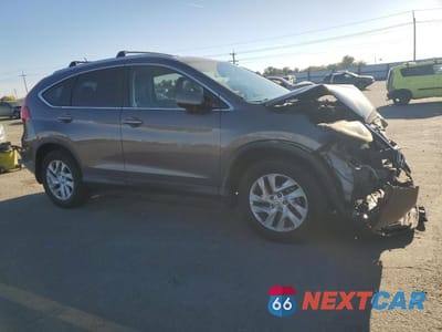 Czwarte zdjęcie samochodu z boku: 2015 HONDA CR-V VIN:2HKRM4H78FH640103 - miniatura