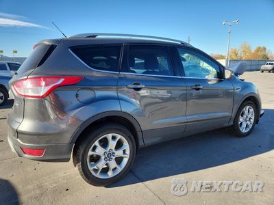 Trzecie zdjęcie samochodu z tyłu: 2016 FORD ESCAPE TITANIUM VIN:1FMCU9J91GUC42989 - miniatura