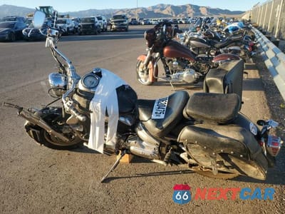 Trzecie zdjęcie samochodu z tyłu: 2003 YAMAHA XVS1100 A VIN:JYAVP11E23A044562 - miniatura