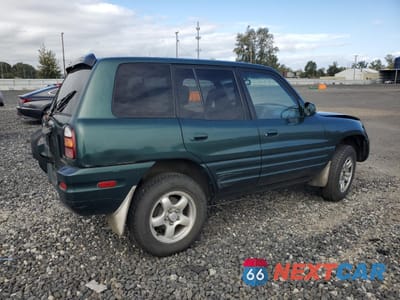 Trzecie zdjęcie samochodu z tyłu: 2000 TOYOTA RAV4 VIN:JT3HP10V3Y7155343 - miniatura