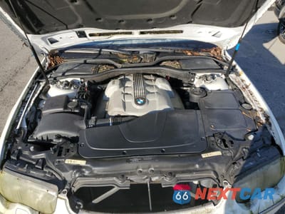 Zdjęcie 11 z 12 samochodu: 2005 BMW 745 LI VIN:WBAGN63595DS59111 - miniatura