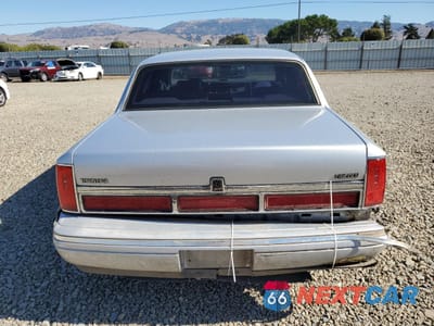 Zdjęcie 6 z 12 samochodu: 1997 LINCOLN TOWN CAR EXECUTIVE VIN:1LNLM81W2VY715658 - miniatura