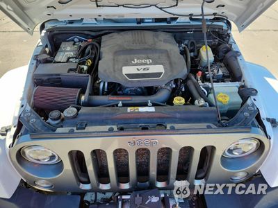 Zdjęcie 12 z 13 samochodu: 2014 JEEP WRANGLER UNLIMITED SPORT VIN:1C4BJWDG7EL199537 - miniatura