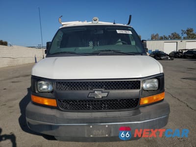 Piąte zdjęcie samochodu w środku: 2014 CHEVROLET EXPRESS DELIVERY VAN VIN:1GCWGFCBXE1136000 - miniatura