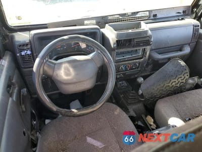 Zdjęcie 8 z 13 samochodu: 2001 JEEP WRANGLER / TJ SPORT VIN:1J4FA49S41P342444 - miniatura