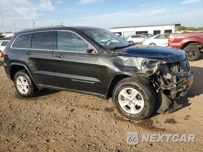 Czwarte zdjęcie samochodu z boku: 2014 JEEP GRAND CHEROKEE LAREDO VIN:1C4RJFAG4EC104290 - miniatura