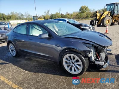 Czwarte zdjęcie samochodu z boku: 2023 TESLA MODEL 3 VIN:5YJ3E1EA2PF641832 - miniatura