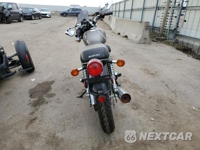 Czwarte zdjęcie samochodu z boku: 2012 SUZUKI TU250 X VIN:JS1NJ4CA5C2101116 - miniatura