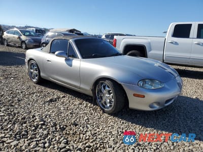 Czwarte zdjęcie samochodu z boku: 2001 MAZDA MX-5 MIATA BASE VIN:JM1NB353410215614 - miniatura