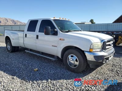 Czwarte zdjęcie samochodu z boku: 2004 FORD F350 SUPER VIN:1FTWW32P94EB65476 - miniatura