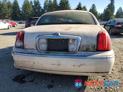 Zdjęcie 6 z 12 samochodu: 2001 LINCOLN TOWN CAR CARTIER VIN:1LNHM83W01Y665887 - miniatura