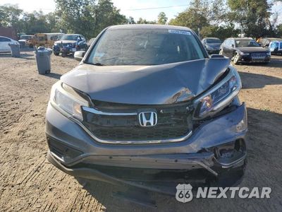 Piąte zdjęcie samochodu w środku: 2016 HONDA CR-V LX VIN:2HKRM4H39GH610400 - miniatura