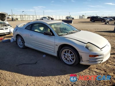 Czwarte zdjęcie samochodu z boku: 2002 MITSUBISHI ECLIPSE GT VIN:4A3AC54H62E074308 - miniatura