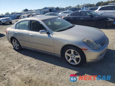 Czwarte zdjęcie samochodu z boku: 2003 INFINITI G35 VIN:JNKCV51E43M015022 - miniatura