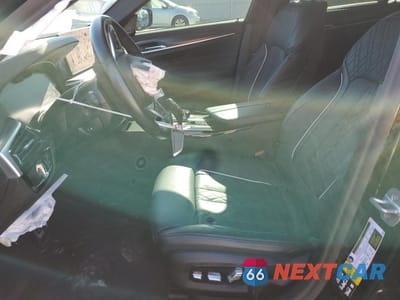 Zdjęcie 7 z 12 samochodu: 2022 BMW M550XI VIN:WBA13BK0XNCJ43688 - miniatura