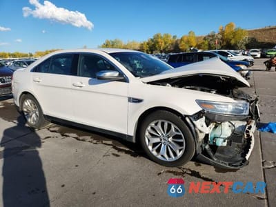 Czwarte zdjęcie samochodu z boku: 2015 FORD TAURUS LIMITED VIN:1FAHP2F8XFG126881 - miniatura