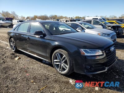 Czwarte zdjęcie samochodu z boku: 2017 AUDI A8 L QUATTRO VIN:WAU43AFD6HN006874 - miniatura