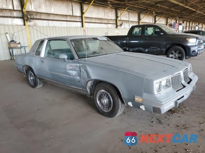 Czwarte zdjęcie samochodu z boku: 1983 OLDSMOBILE CUTLASS SUPREME BROUGHAM VIN:1G3AM47A2DM314679 - miniatura
