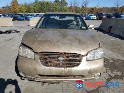 Piąte zdjęcie samochodu w środku: 2001 NISSAN MAXIMA GXE VIN:JN1CA31D71T804764 - miniatura