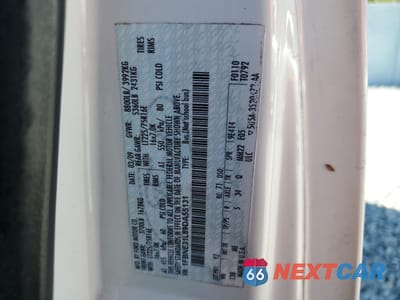 Zdjęcie 13 z 15 samochodu: 2009 FORD ECONOLINE E350 SUPER DUTY WAGON VIN:1FBNE31L89DA55131 - miniatura